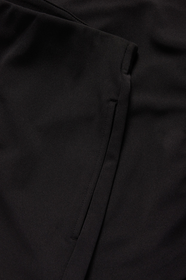 Women - Jersey trousers - high waist - wide leg - black