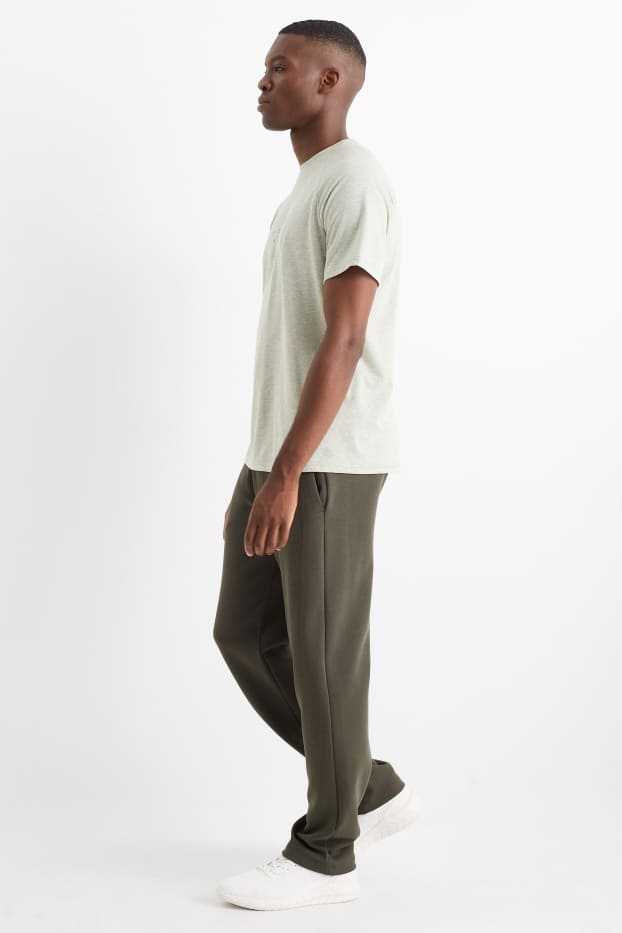 Bărbați - Pantaloni de trening funcționali - verde închis