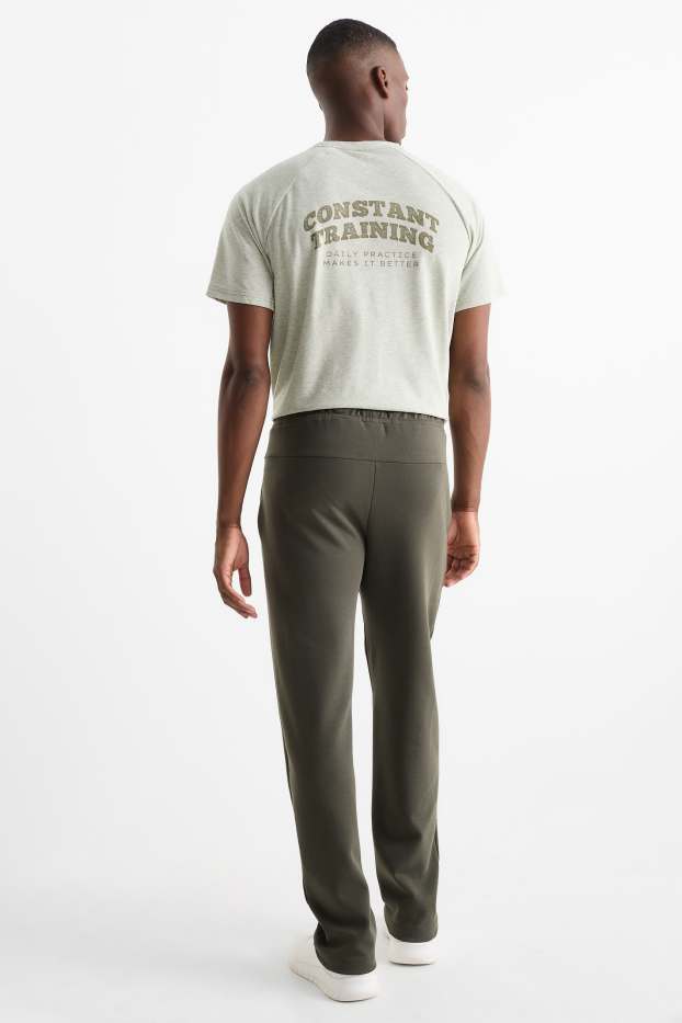 Bărbați - Pantaloni de trening funcționali - verde închis