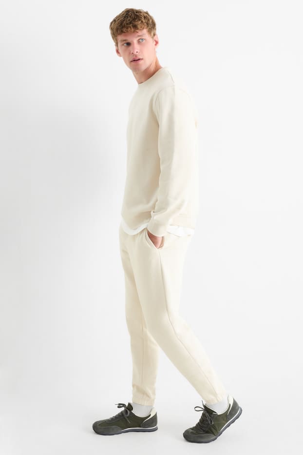 Hombre - Pantalón de deporte - blanco roto