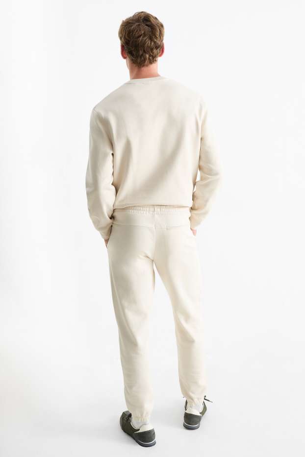 Hombre - Pantalón de deporte - blanco roto