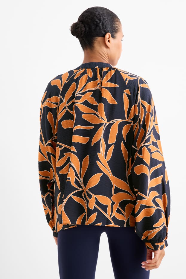 Dames - Blouse met V-hals - gebloemd - oranje / zwart