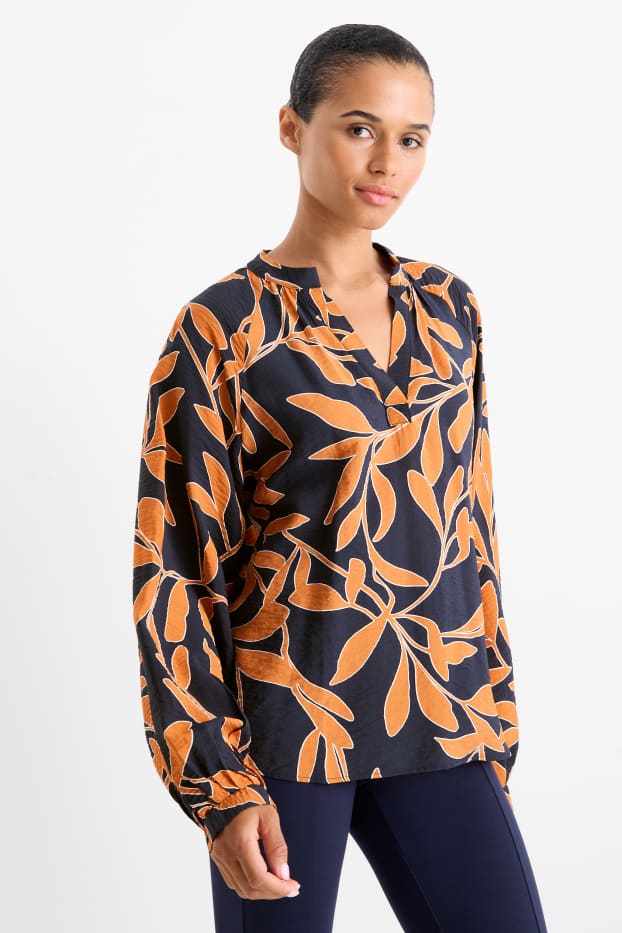Dames - Blouse met V-hals - gebloemd - oranje / zwart