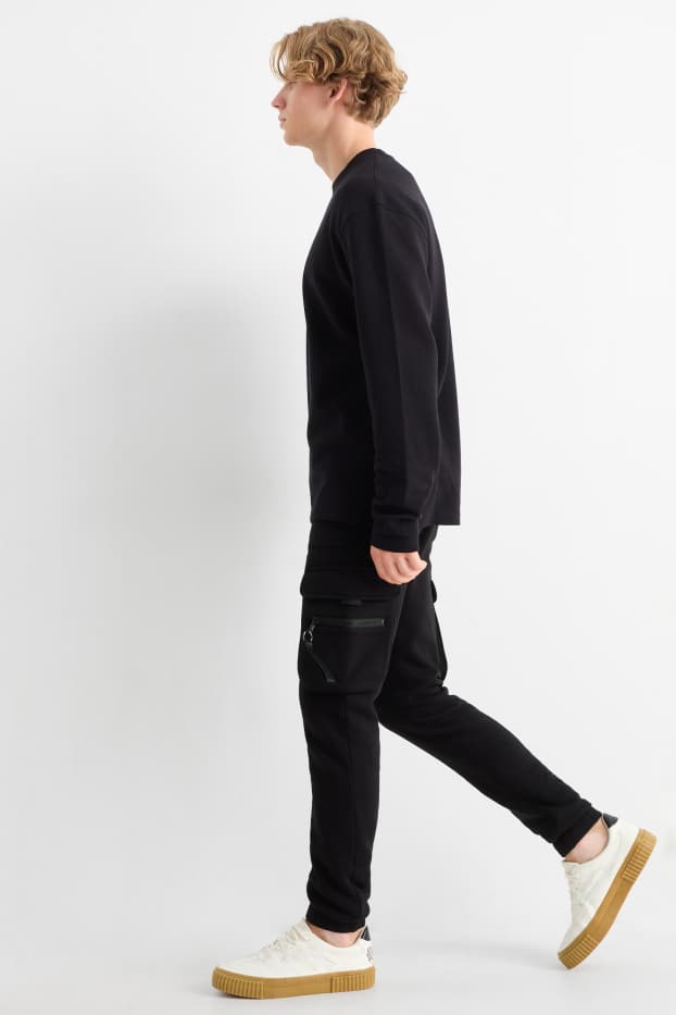 Uomo - Pantaloni sportivi cargo - nero