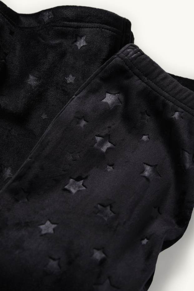 Kinder Mädchen - Sterne - Flared Leggings - schwarz