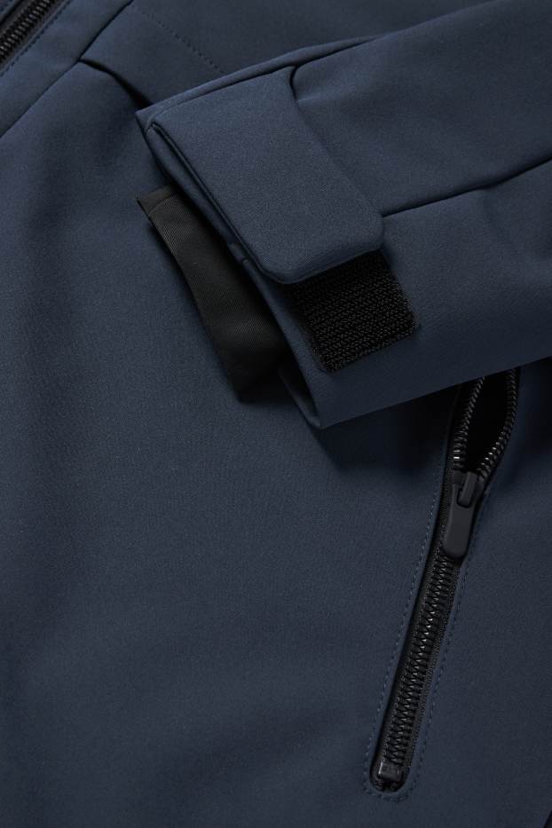 Hommes - Veste à coquille souple avec capuche - finition doublée - finition déperlante - 4 Way Stretch - bleu foncé