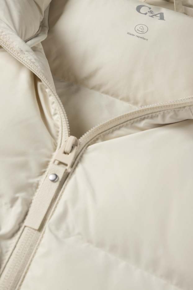 Dames - Jas met stiksels met capuchon - waterafstotend - licht beige