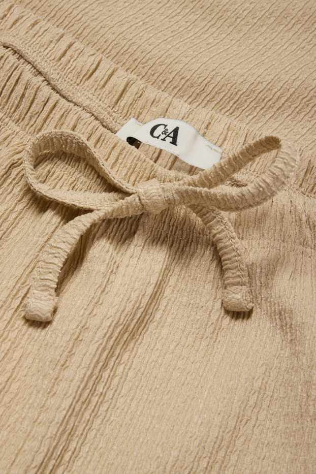 Femmes - Pantalon en jersey - mid waist - wide leg - finition texturée - beige