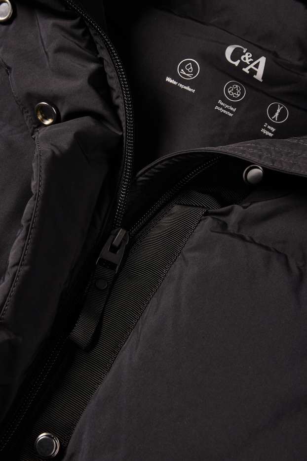 Dames - Mantel met stiksels en capuchon - waterafstotend - zwart