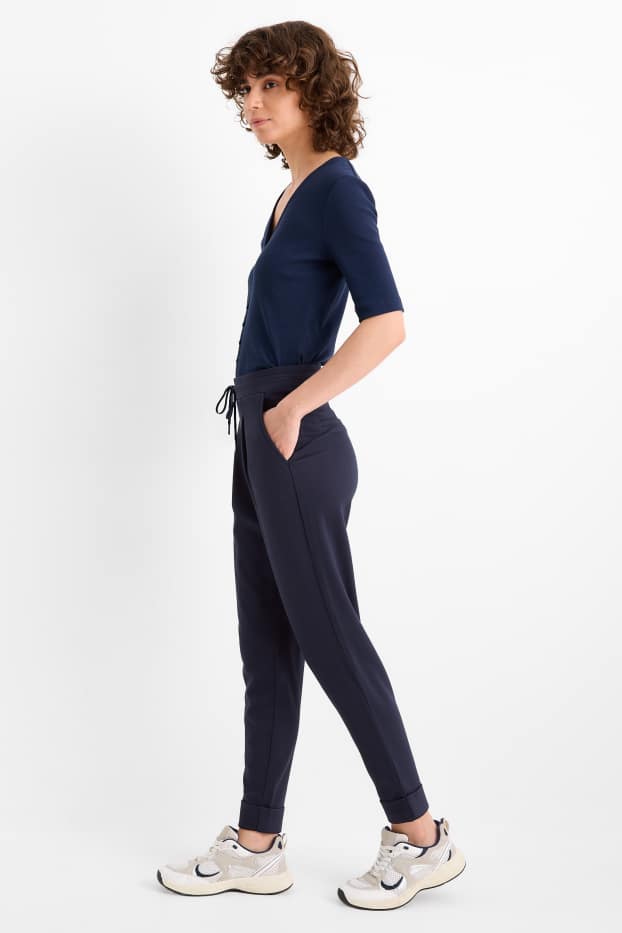 Dames - Broek van jersey - mid waist - tapered fit - donkerblauw