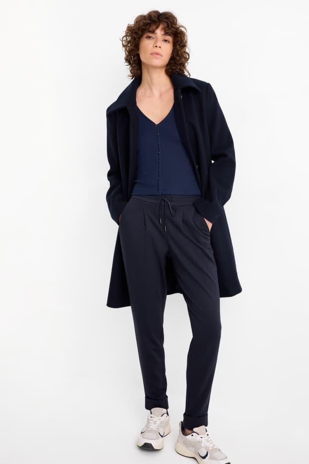 Dames - Broek van jersey - mid waist - tapered fit - donkerblauw