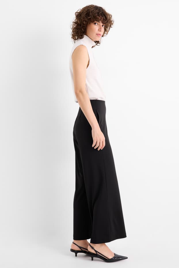 Women - Jersey trousers - high waist - wide leg - black