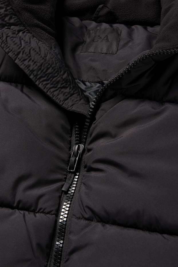 Home - Armilla embuatada - negre