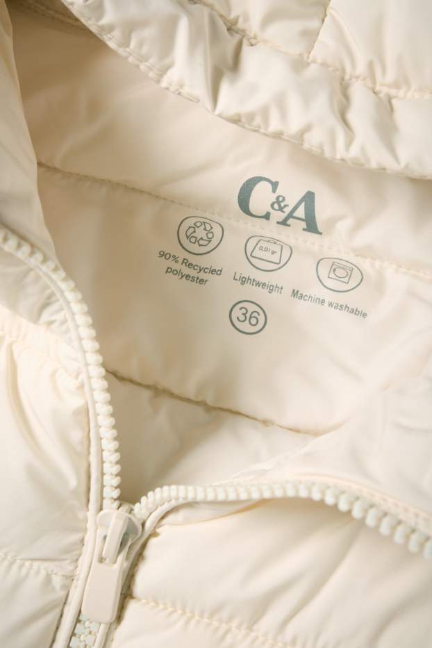 Dámské - Prošívaný kabát s kapucí - krémové barvy