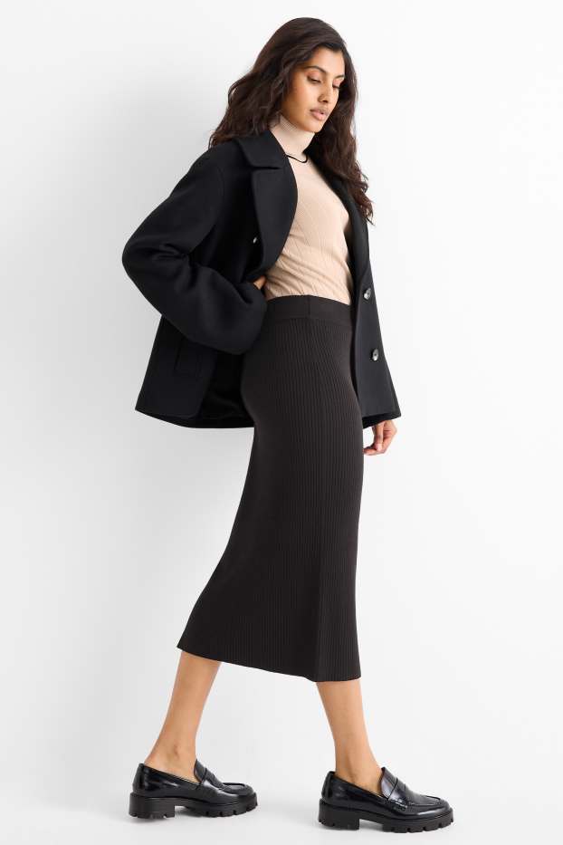 Women - Knitted skirt - ribbed - black