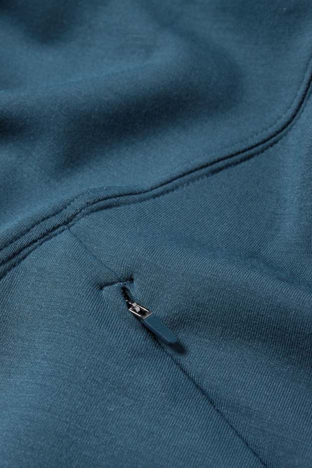 Dona - Dessuadora esportiva amb caputxa - ioga - petroli