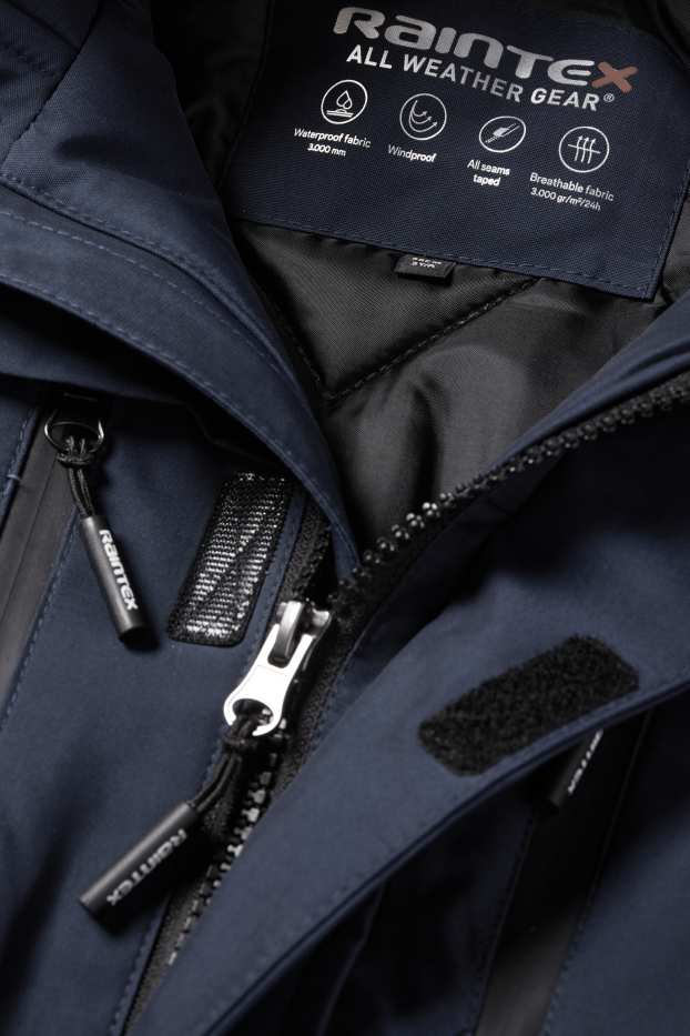 Kinderen: jongens - Regenjas met capuchon en imitatiebontrandje - gevoerd - donkerblauw