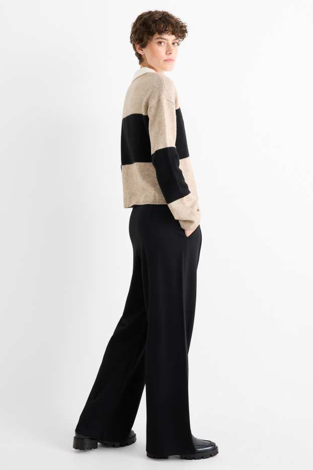 Dámské - Žerzejové kalhoty s páskem - high waist - wide leg - černá