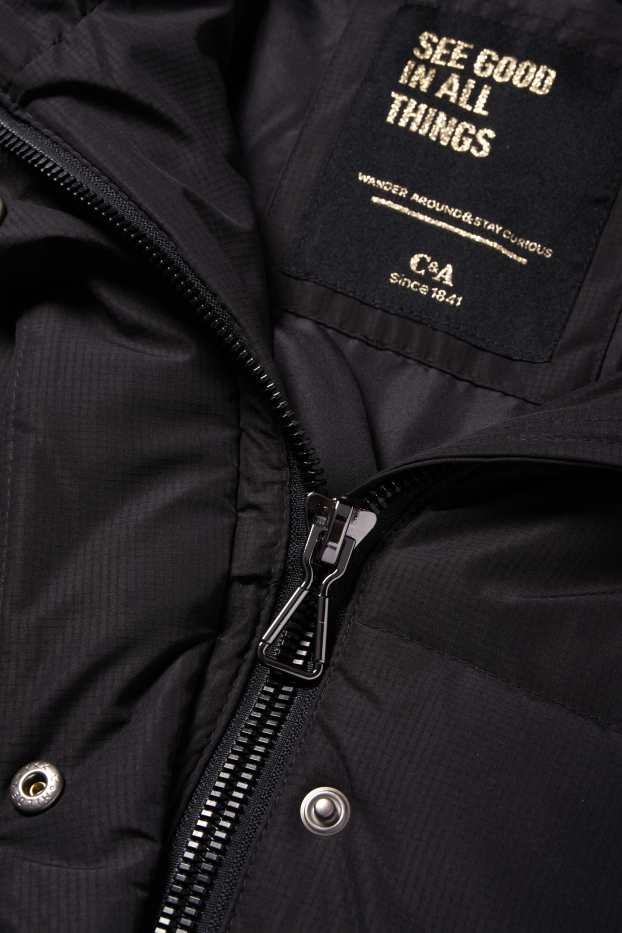 Kinder Mädchen - Daunenjacke mit Kapuze und Kunstfellbesatz - schwarz