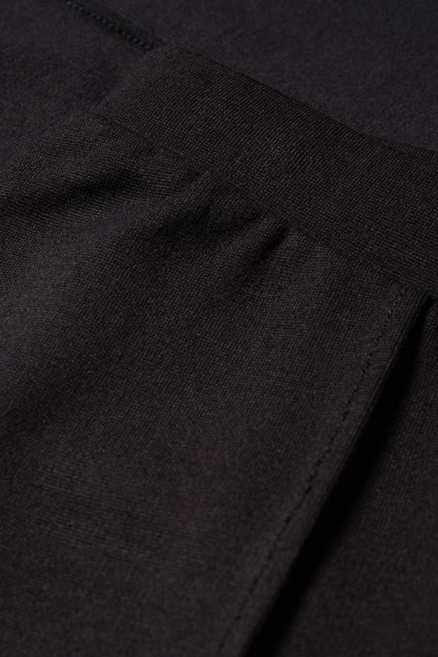 Kinder Mädchen - Flared Leggings - schwarz