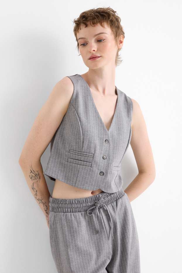 Dona - Americana - entallada - ratlla diplomàtica - gris