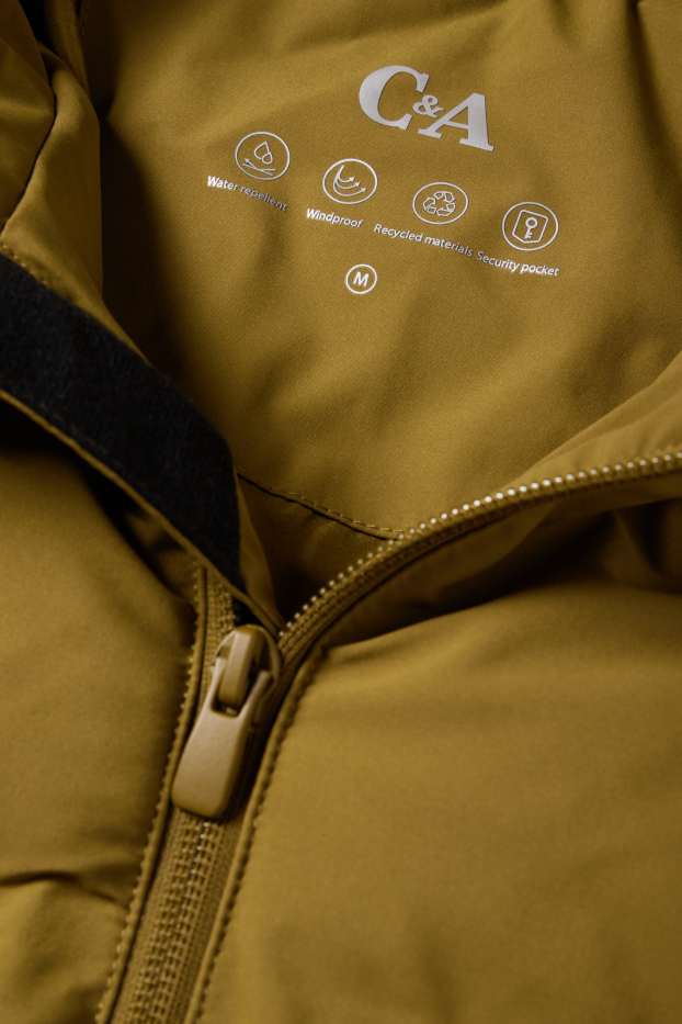 Home - Jaqueta embuatada amb caputxa - impermeable - caqui