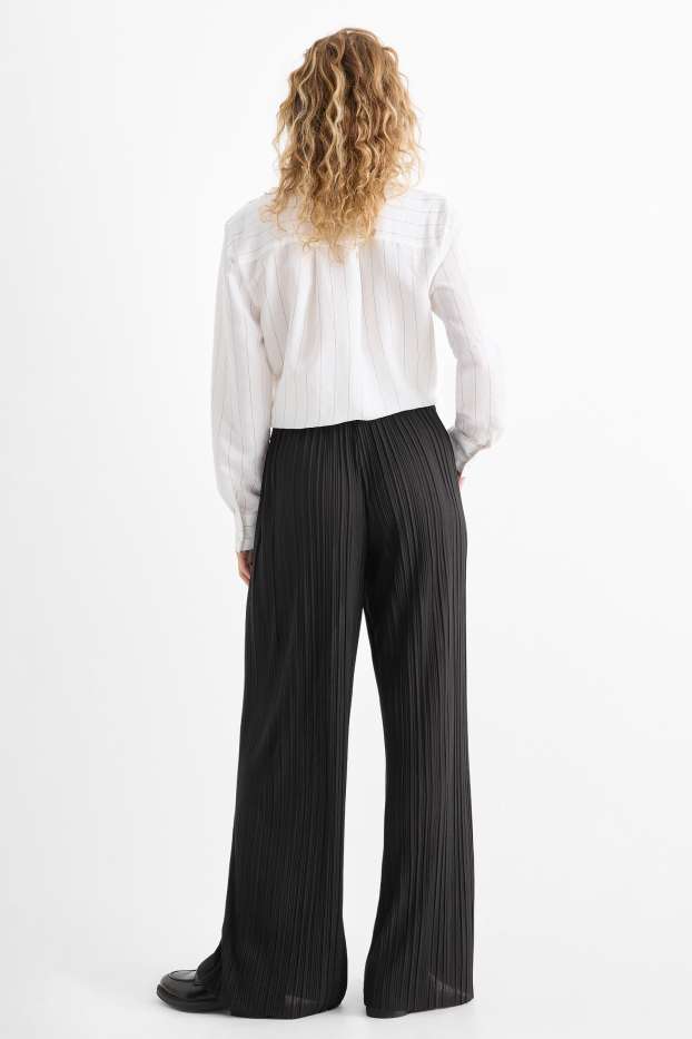 Women - Plissé trousers - high-rise waist - wide leg - black