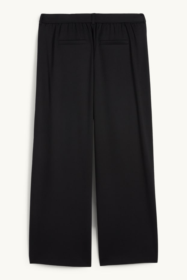 Women - Jersey trousers - mid-rise waist - flared fit - black