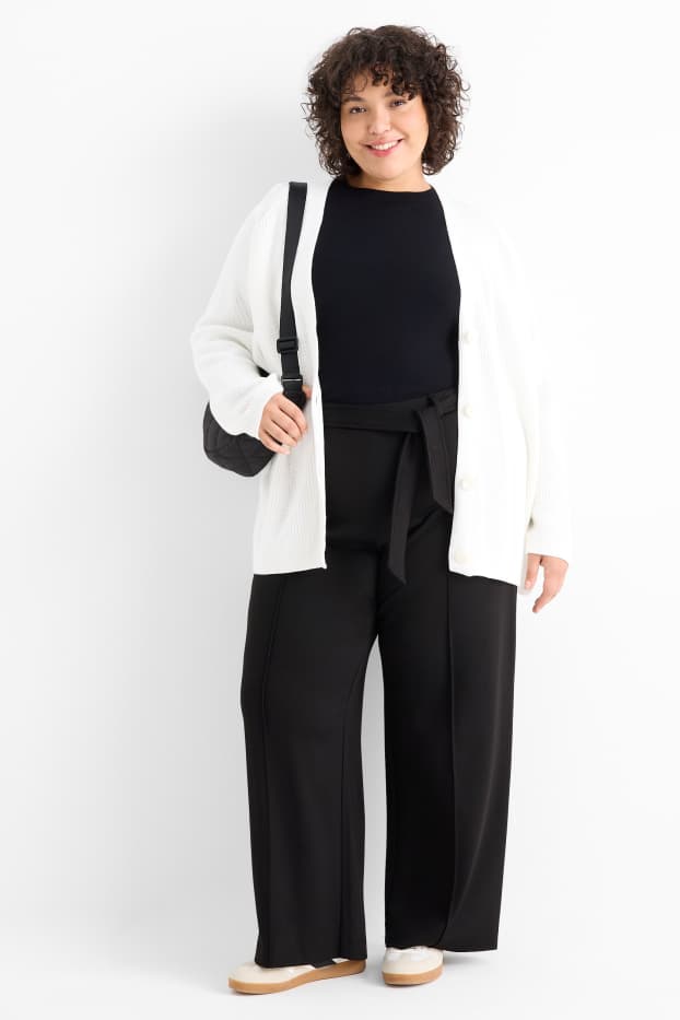 Women - Jersey trousers - mid-rise waist - flared fit - black