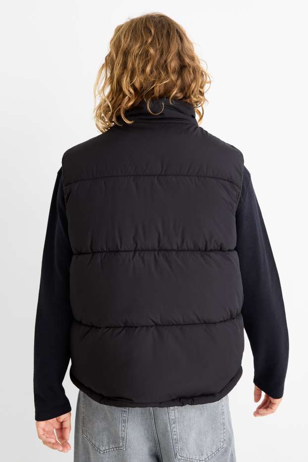 Home - Armilla embuatada - negre