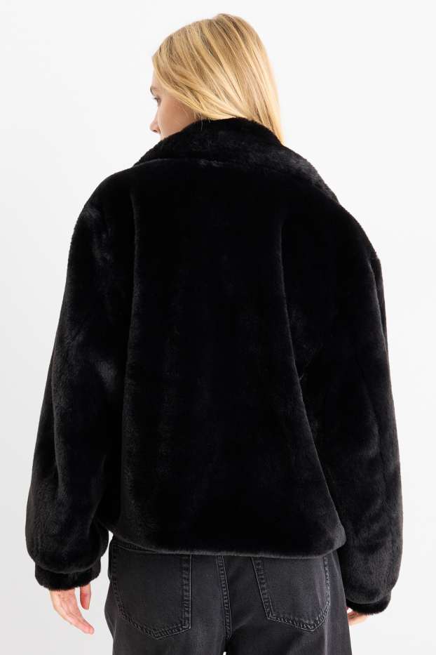 Femmes - Veste en imitation fourrure - noir