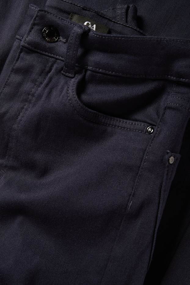 Femei - Pantaloni de stofă - talie înaltă - evazați - albastru închis