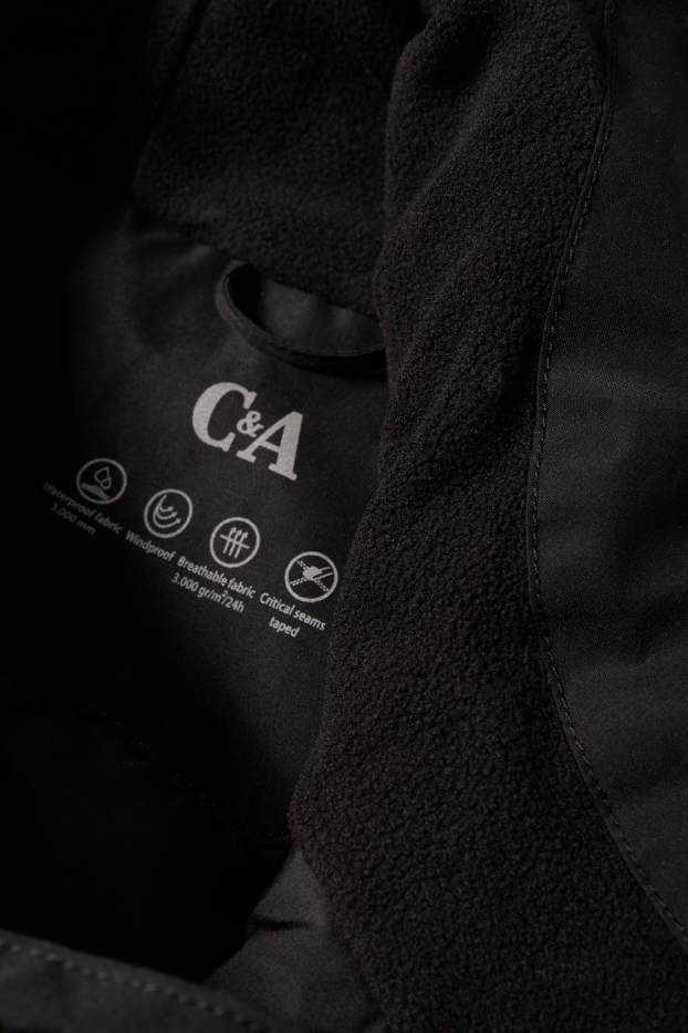 Femmes - Parka de pluie avec capuche - rembourrée - imperméable - noir