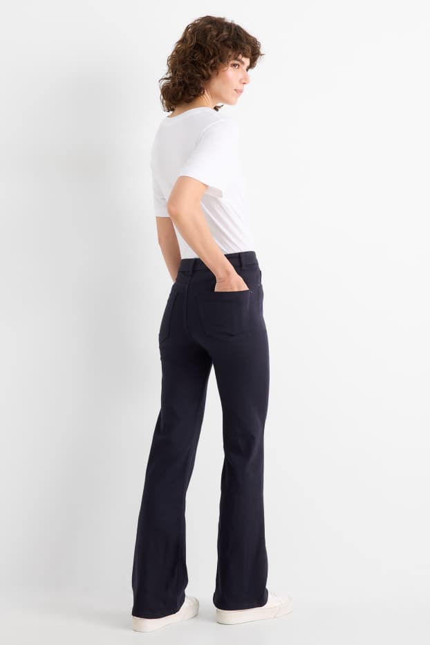 Femei - Pantaloni de stofă - talie înaltă - evazați - albastru închis