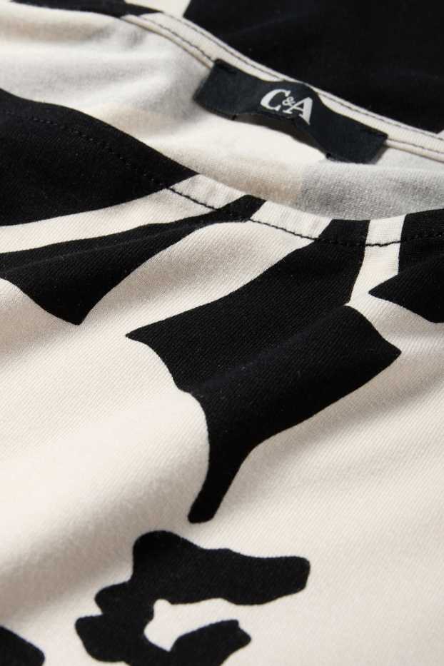 Dames - Longsleeve - regular fit - gebloemd - zwart / wit