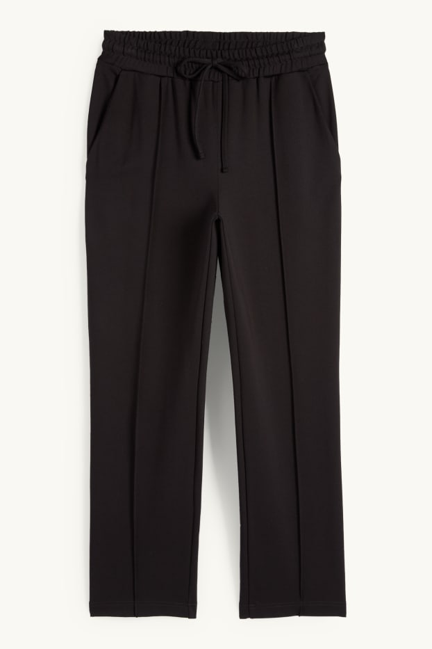 Dona - Pantalons de punt - mid waist - tapered fit - negre