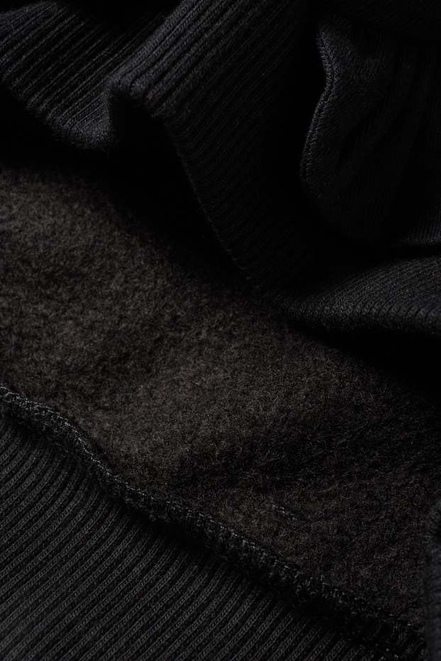 Nena - Os de peluix - dessuadora nadalenca - negre