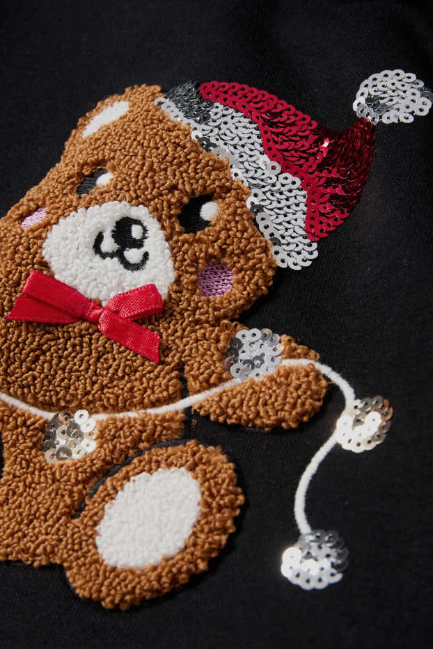 Nena - Os de peluix - dessuadora nadalenca - negre