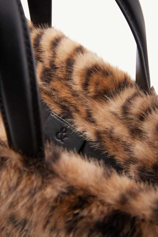 Dames - Kleine shopper van imitatiebont, met afneembare draagriem. - zwart / beige