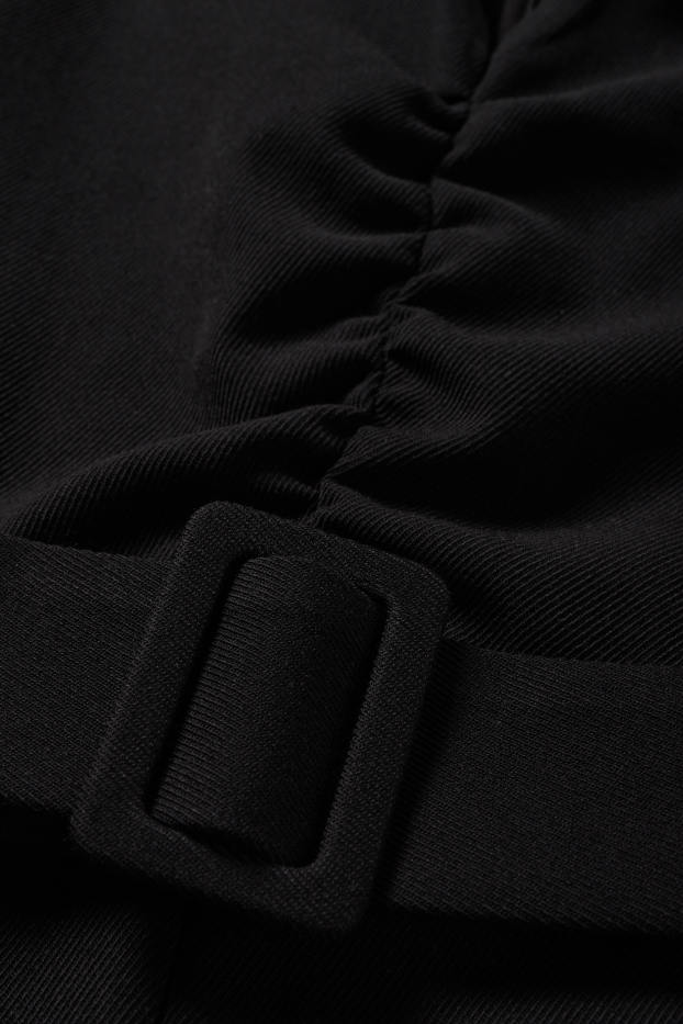 Damen - Jumpsuit mit Gürtel - schwarz