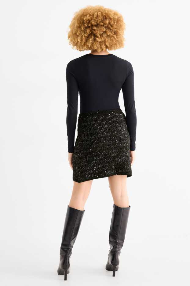 Damen - Bouclé-Minirock - strukturiert - schwarz