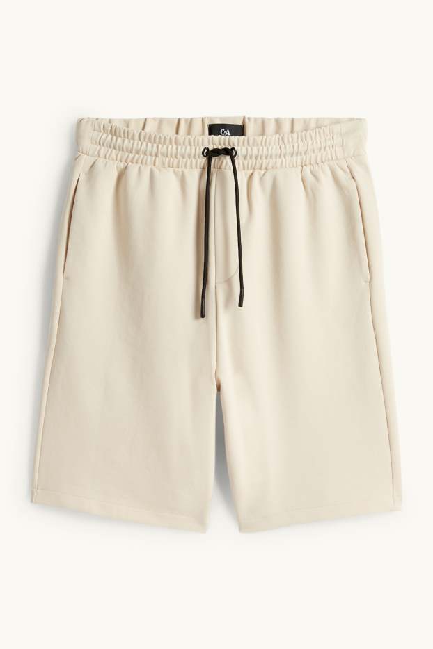 Bărbați - Pantaloni scurți de trening - structurați - bej deschis