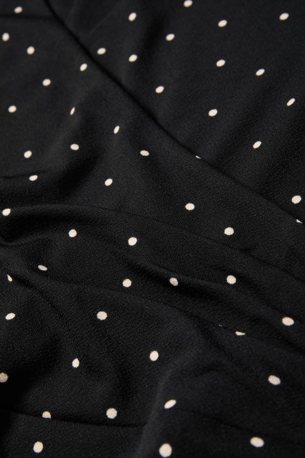 Damen - Kleid mit V-Ausschnitt - Straight Fit - gepunktet - schwarz