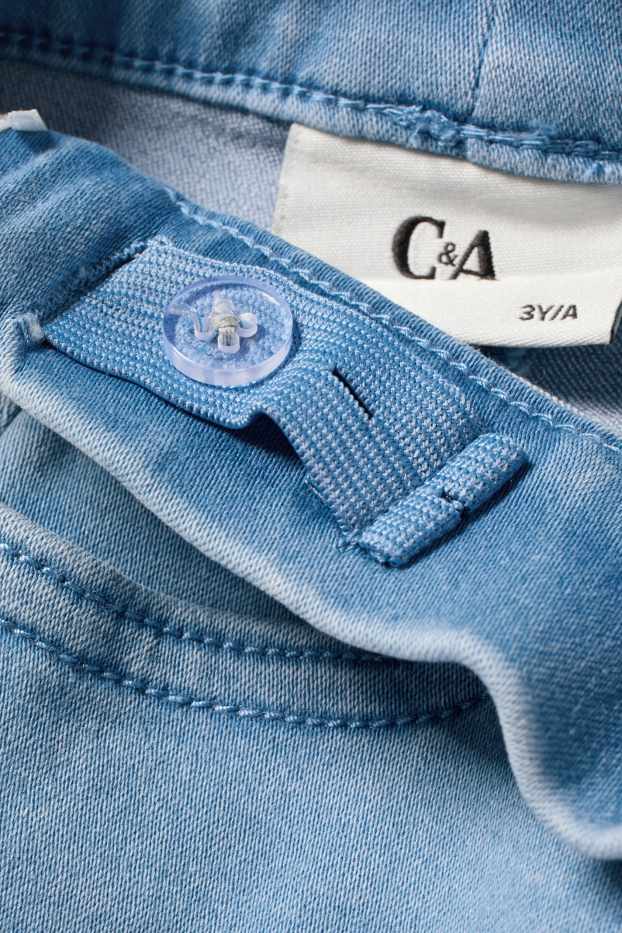 Copii - Fete - Minnie Mouse - flared jeans - aspect lucios - albastru deschis