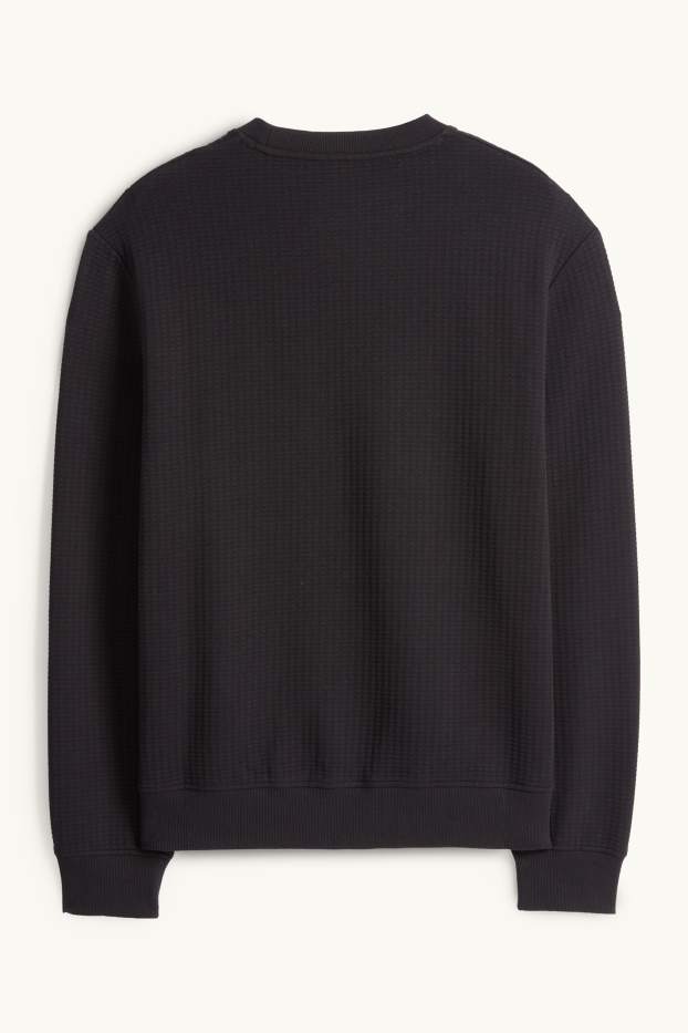 Home - Dessuadora - texturada - negre