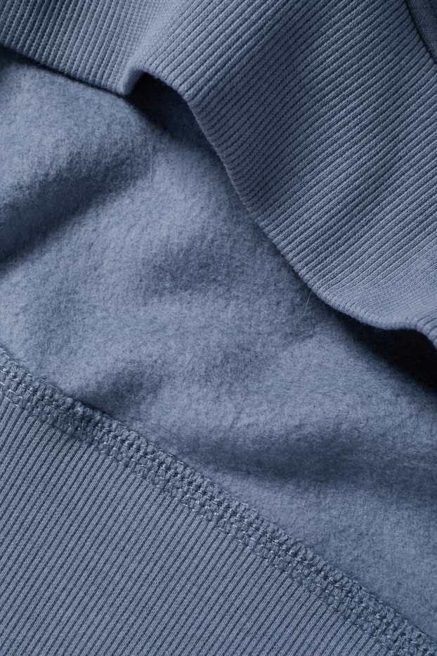 Home - Dessuadora oversized amb caputxa - blau