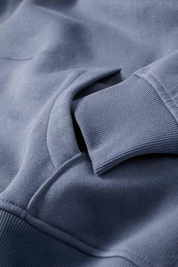 Home - Dessuadora oversized amb caputxa - blau