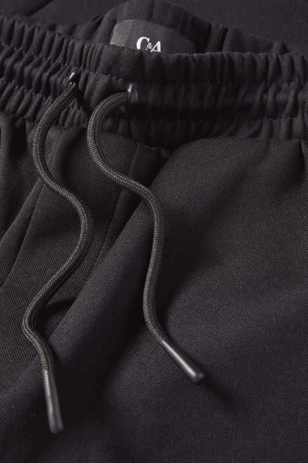 Bărbați - Pantaloni scurți de trening - structurați - negru