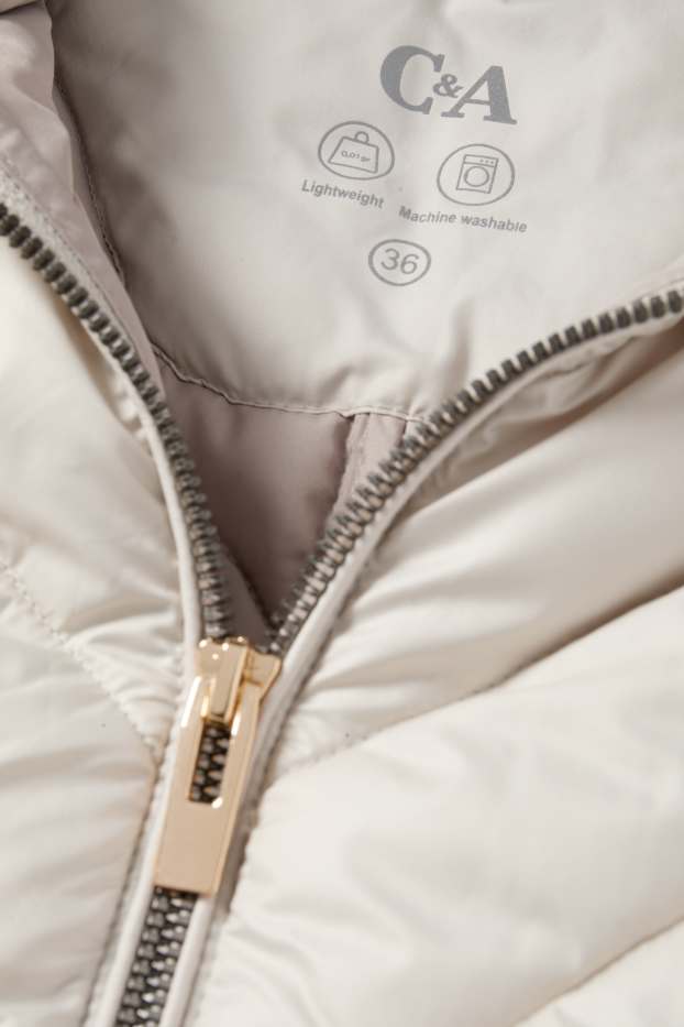 Dona - Jaqueta embuatada amb caputxa - gris clar