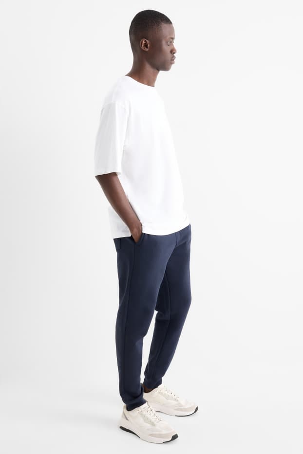 Hommes - Pantalon de jogging - bleu foncé